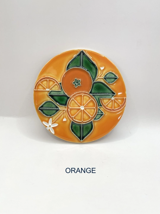 Ręcznie robiona podstawka ceramiczna z motywem pomarańczy
