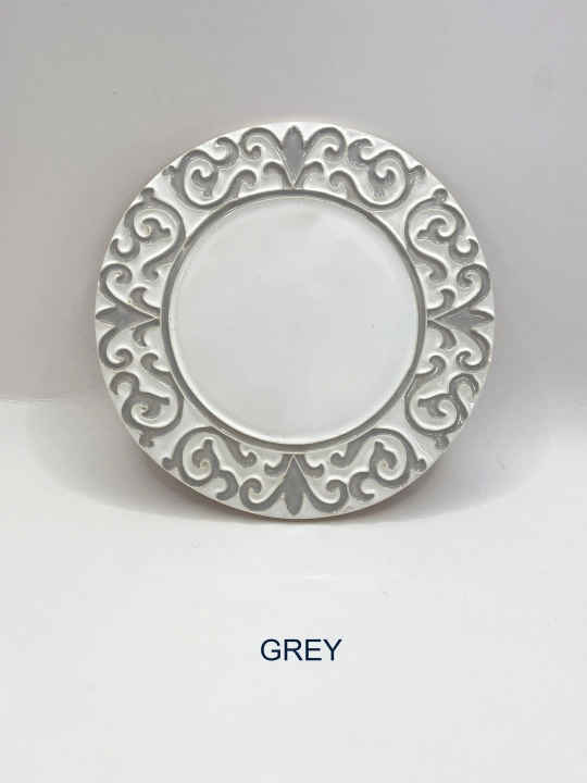 Ręcznie robiona podstawka ceramiczna z motywem ornamentu